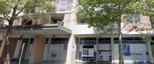 Life Medical Clinic storefront at 822 Bourke St Waterloo with blue and white signage beneath residential balconies